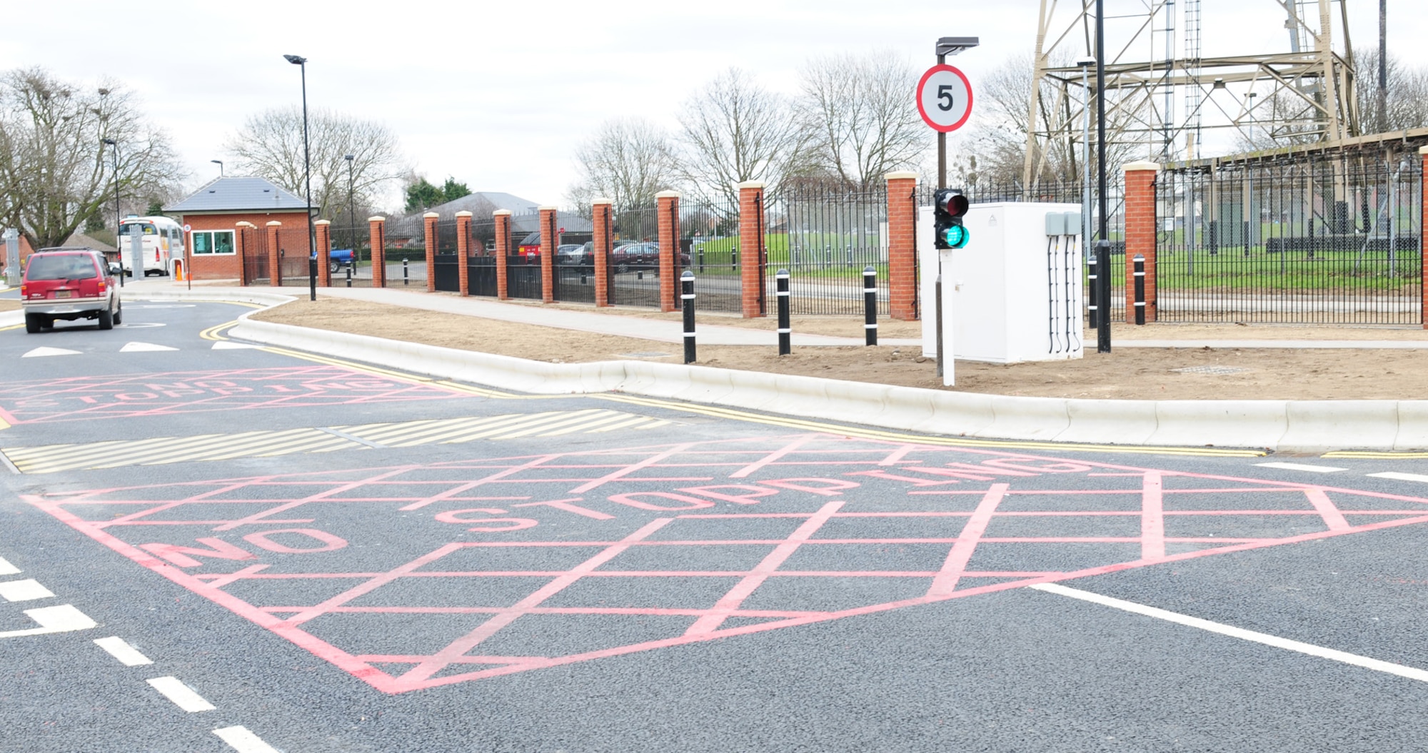 RAF MILDENHALL, England -- The Bird in Hand Gate, Gate 17, opened Feb. 17, 2012, and base members can now use the gate to leave base. It is a vehicle exit only, but pedestrians (with base ID cards) can enter and exit there. Gate 15, the Main Gate is now vehicle and pedestrian entry only. The construction, which cost £1.3 million for the Lincoln Road East area, consisted of changes including a new Delta barrier and bollards, new entry control point, alteration of the road layout and addition of pedestrian crossings, electrical works and signage. The updates have been made to improve safety for base personnel. (U.S. Air Force photo/Karen Abeyasekere)