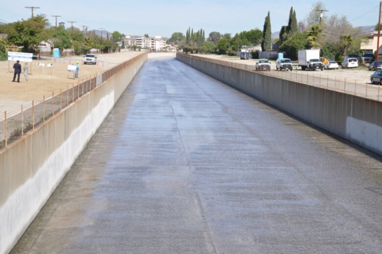 LOS ANGELES, Calif. — Officials from the U.S. Army Corps of Engineers Los Angeles District and Los Angeles County broke ground on a patch of dirt adjacent to this stretch of Tujunga Wash Feb. 22 for a project designed to restore degraded habitat in the San Fernando Valley.