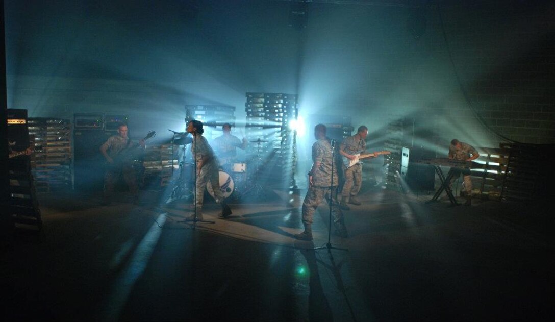 Max Impact, the premier rock band of the United States Air Force, performs during the production of their "Send Me" video.  U.S. Air Force photo by Master Sgt. Bob Kamholz.