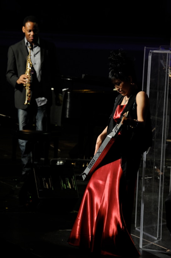 Keiko Matsui, contemporary jazz pianist, plays the Keytar during  the USAF Band's Guest Artist Series Feb. 26 at the at Daughters of the American Revolution Constitution Hall in Washington, D.C. Since its formation in 1941, The United States Air Force Band has brought entertainment to music lovers around the globe, earning its reputation as "America's International Musical Ambassadors." (U.S. Air Force photo/ Staff Sgt. Nichelle Anderson)