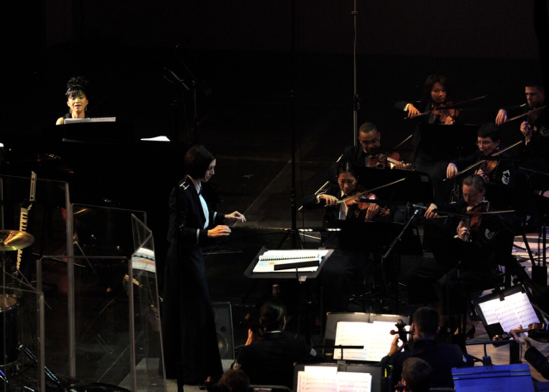 Keiko Matsui performs with the United States Air Force Band as the guest artist at the at Daughters of the American Revolution Constitution Hall in Washington, D.C. on Feb. 26.  (U.S. Air Force photo/ Staff Sgt. Nichelle Anderson)