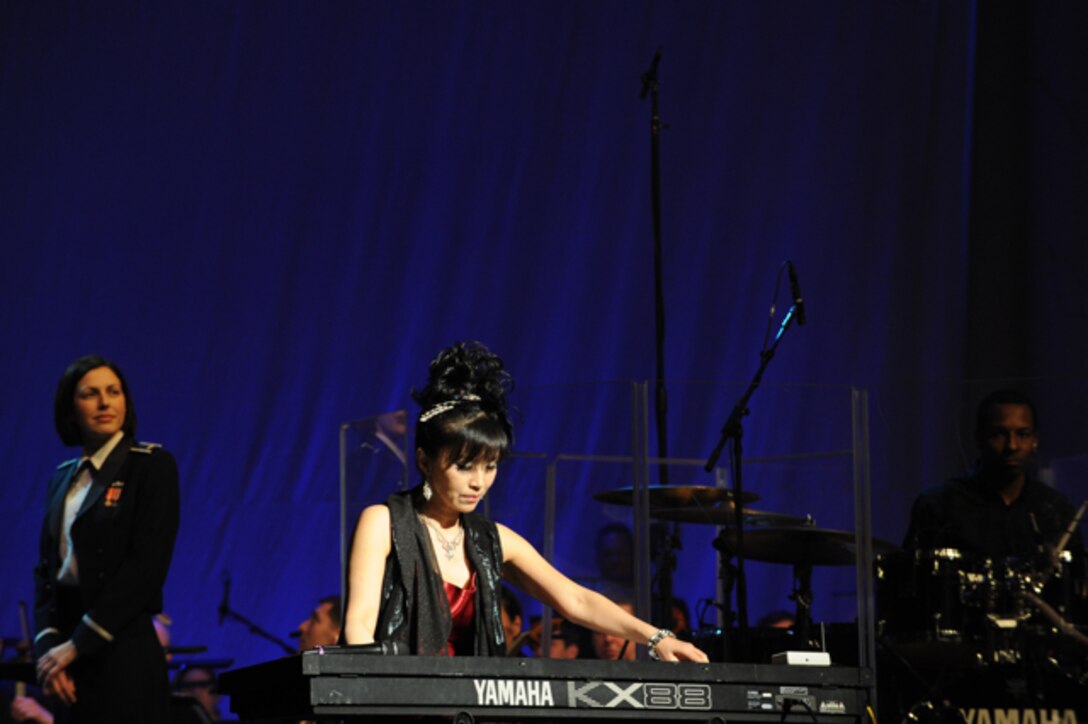 Keiko Matsui performs with the United States Air Force band as the guest artist at the Daughters of the American Revolution Constitution Hall in Washington, D.C. on Feb. 26.  Keiko has brought her music to virtually every corner of the world. (U.S. Air Force photo/ Staff Sgt. Nichelle Anderson)