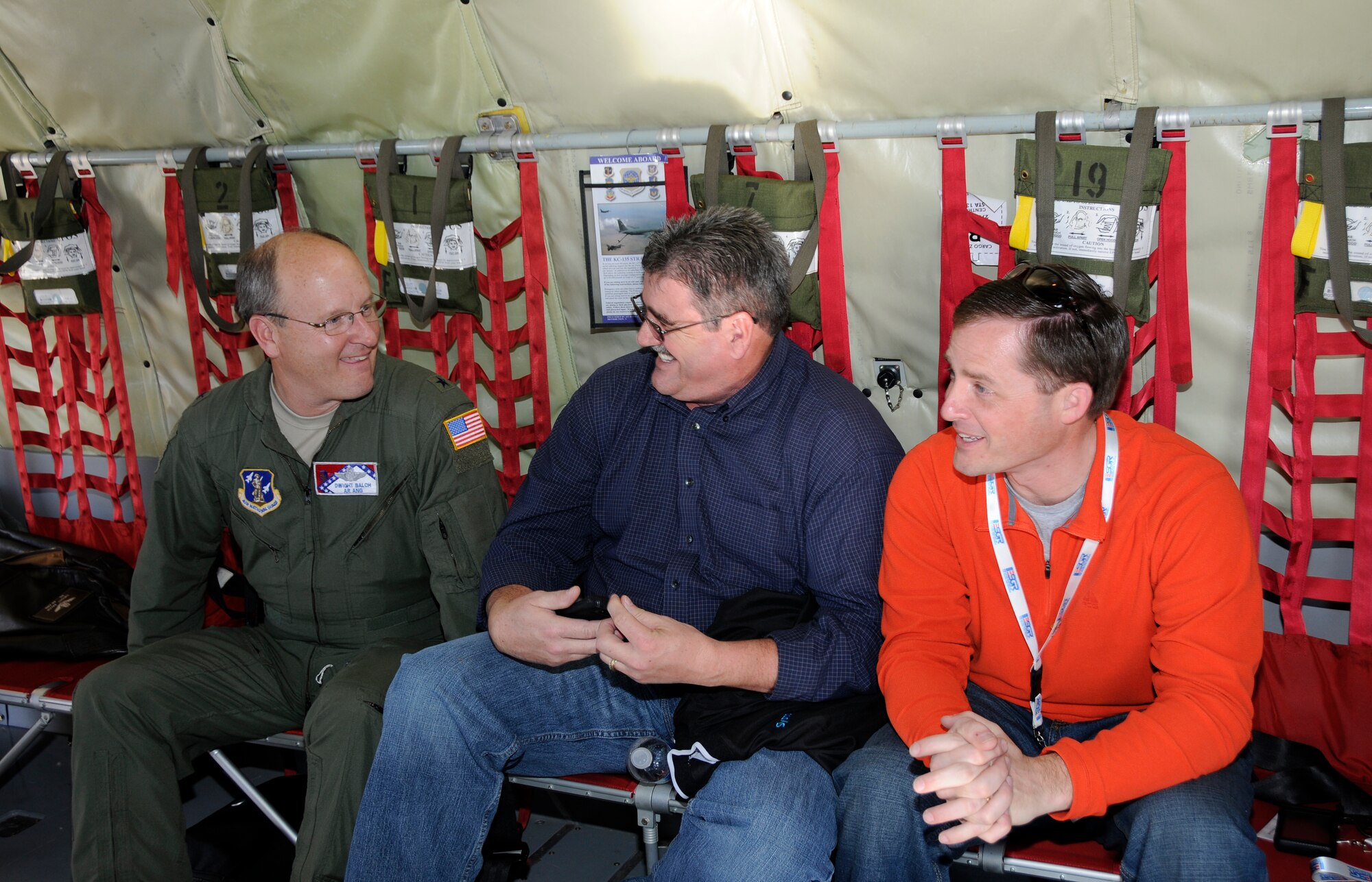 Brig. Gen. Dwight Balch, Arkansas Air National Guard commander, left, visits with civilian employers aboard a KC-135 Stratotanker. More than 40 local employers visited the Arkansas Air National Guard’s 188th Fighter Wing at Davis-Monthan Air Force Base, Ariz., Feb. 22-23 to watch the Flying Razorbacks and their A-10C Thunderbolt II “Warthogs” participate in Operation Snowbird, a combat rehearsal for the unit’s deployment to Afghanistan this summer in support of Operation Enduring Freedom. The event was part of an Employer Support for the Guard and Reserve (ESGR) trip. The objective was to give employers a better understanding of how vital the Guardsmen they employ are to the mission and how they each play a key role in the unit’s success. (National Guard photo by Airman 1st Class Hannah Landeros/188th Fighter Wing Public Affairs)