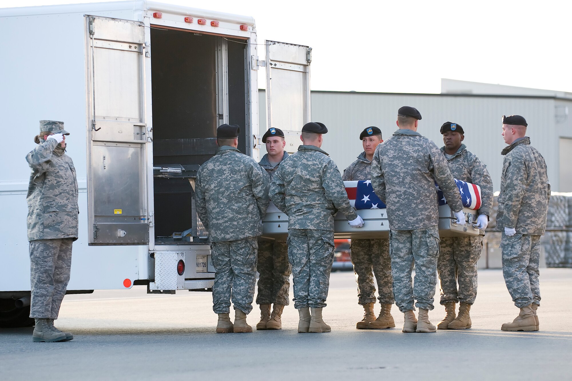 A U.S. Army carry team transfers the remains of Army Sgt. Timothy J. Conrad of Roanoke, Va., at Dover Air Force Base, Del., Feb. 25, 2012. Conrad was assigned to the 385th Military Police Battalion, 16th Military Police Brigade (Airborne), XVIII Airborne Corps, Fort Stewart, Ga. (U.S. Air Force photo/Adrian R. Rowan)
