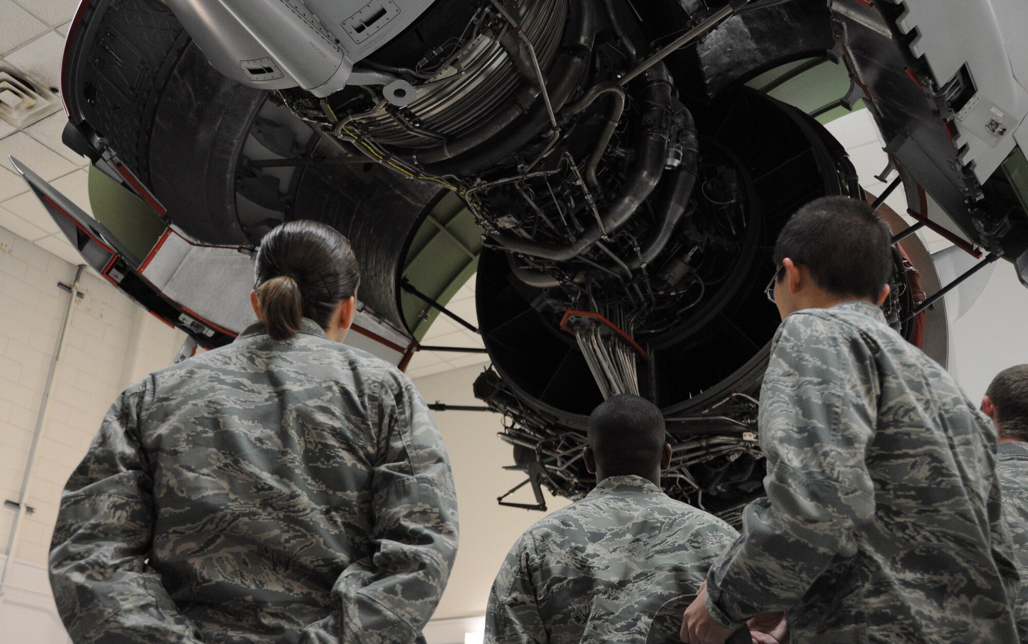 Cadets from the U.S. Air Force ROTC Detachment 775 view a C-17 Globemaster III jet engine Feb. 25, 2011 at the 373rd Training Squadron at Joint Base Charleston, S.C. The cadets are students at the University of South Carolina, and they spent their day touring the base and learning about the different career paths within the USAF. (U.S. Air Force photo/Staff Sgt. Shane Ellis)