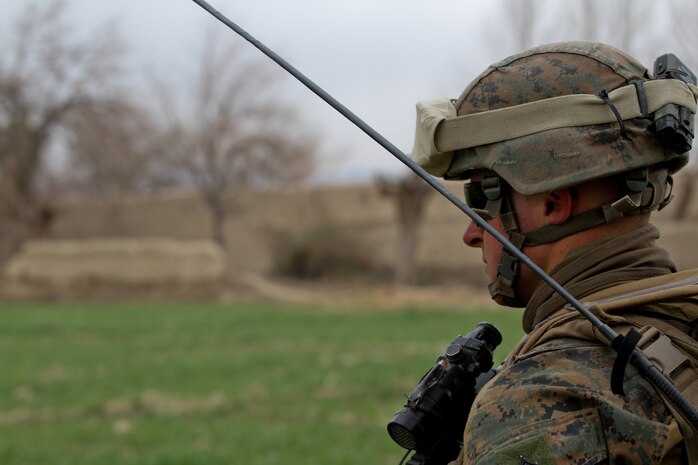 Corporal Ian Ward, a squad leader with 3rd Platoon, Lima Company, walks through an unfarmed field during a patrol Feb. 26, 2012. Ward, currently deployed with 3rd Battalion, 7th Marine Regiment, focused on mentoring his Marines and accomplishing the mission. Ward challenged his Marines to step into more difficult leadership roles, prepping them for when they are squad leaders.