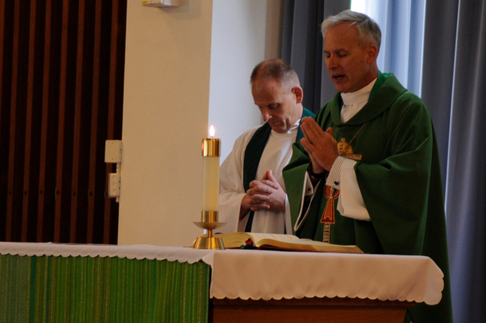 U.S. Army Chaplain (Col.) Frank Richard Spencer, auxiliary bishop of the archdiocese for military services, performs the daily mass as a guest minister at Chapel 1 on Kadena Air Base, Japan, Feb. 21, 2012. The bishop came to Okinawa for a three-day visit to perform a multi-service confirmation for military bases around Okinawa and to also perform mass for Ash Wednesday, the start of the Catholic Easter season. (U.S. Air Force photo by Airman 1st Class Tara A. Williamson/Released)