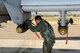 Lt. Col. Marty Dahlem, an A-10C Thunderbolt II pilot with the 188th Fighter Wing, left, conducts a preflight inspection prior to takeoff during a deployment to Davis-Monthan Air Force Base, Ariz., Feb. 21 to participate in Operation Snowbird in preparation for the Flying Razorbacks’ deployment to Afghanistan this summer. (National Guard photo by Senior Master Sgt. Dennis Brambl/188th Fighter Wing Public Affairs)