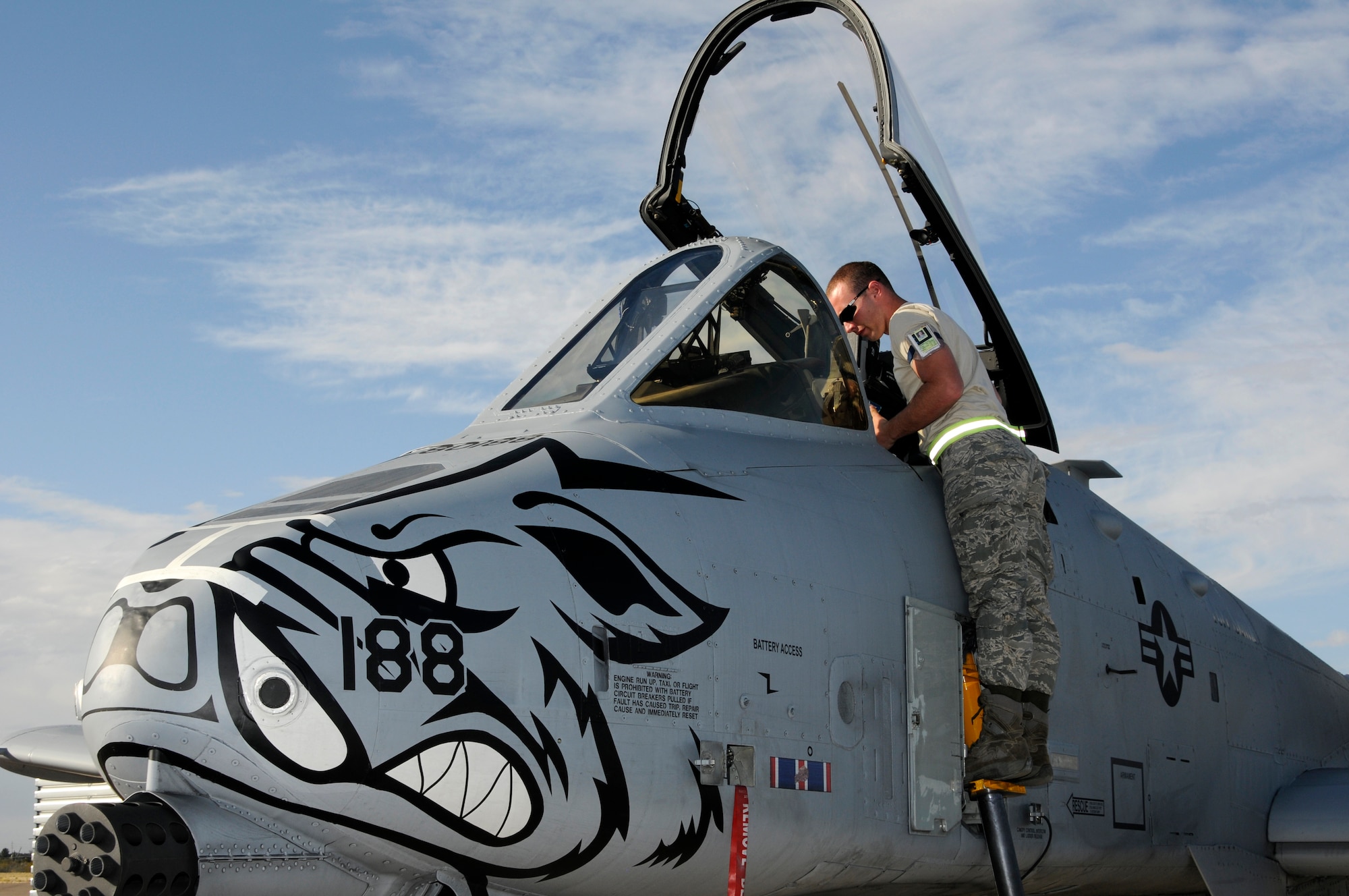 A crew chief with the 188th Fighter Wing preps the cockpit of an A-10C Thunderbolt II “Warthog” for flight at Davis-Monthan Air Force Base, Ariz., Feb. 16. The 188th deployed approximately 300 Airmen to Davis-Monthan AFB to participate in Operation Snowbird in preparation for the Flying Razorbacks’ deployment to Afghanistan this summer. (National Guard photo by Senior Master Sgt. Dennis Brambl/188th Fighter Wing Public Affairs)


