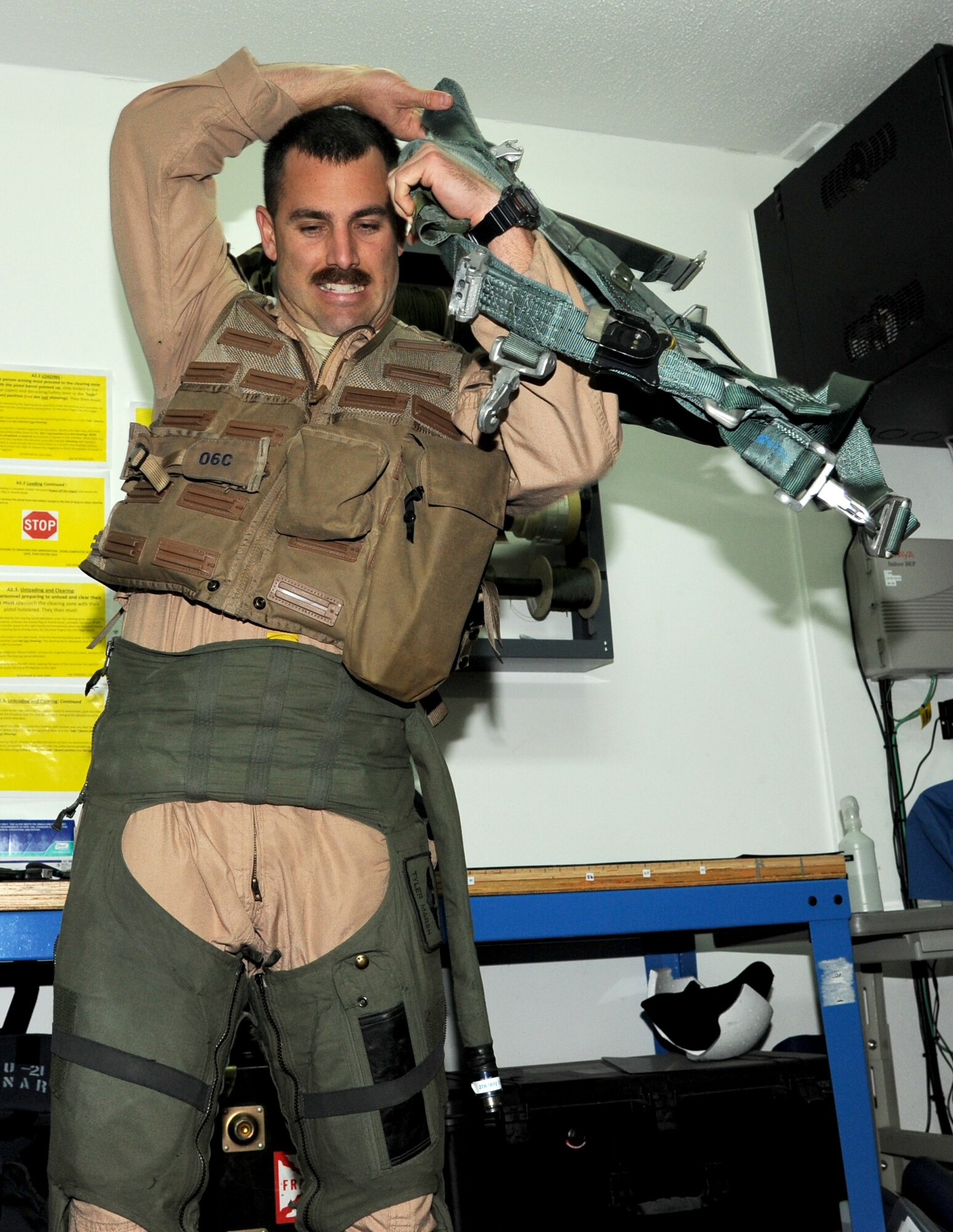 SOUTHWEST ASIA - Capt. Tyler Marsh prepares for a training sortie Feb. 22, 2012. The 44th Expeditionary Fighter Squadron, deployed from Kadena Air Base, Japan, flies with the 380th Air Expeditionary Wing in Southwest Asia. Their mission is both deterrence as part of the defense of the Arabian Gulf, and training with partners in the region. (U.S. Air Force photo/Tech. Sgt. Arian Nead)