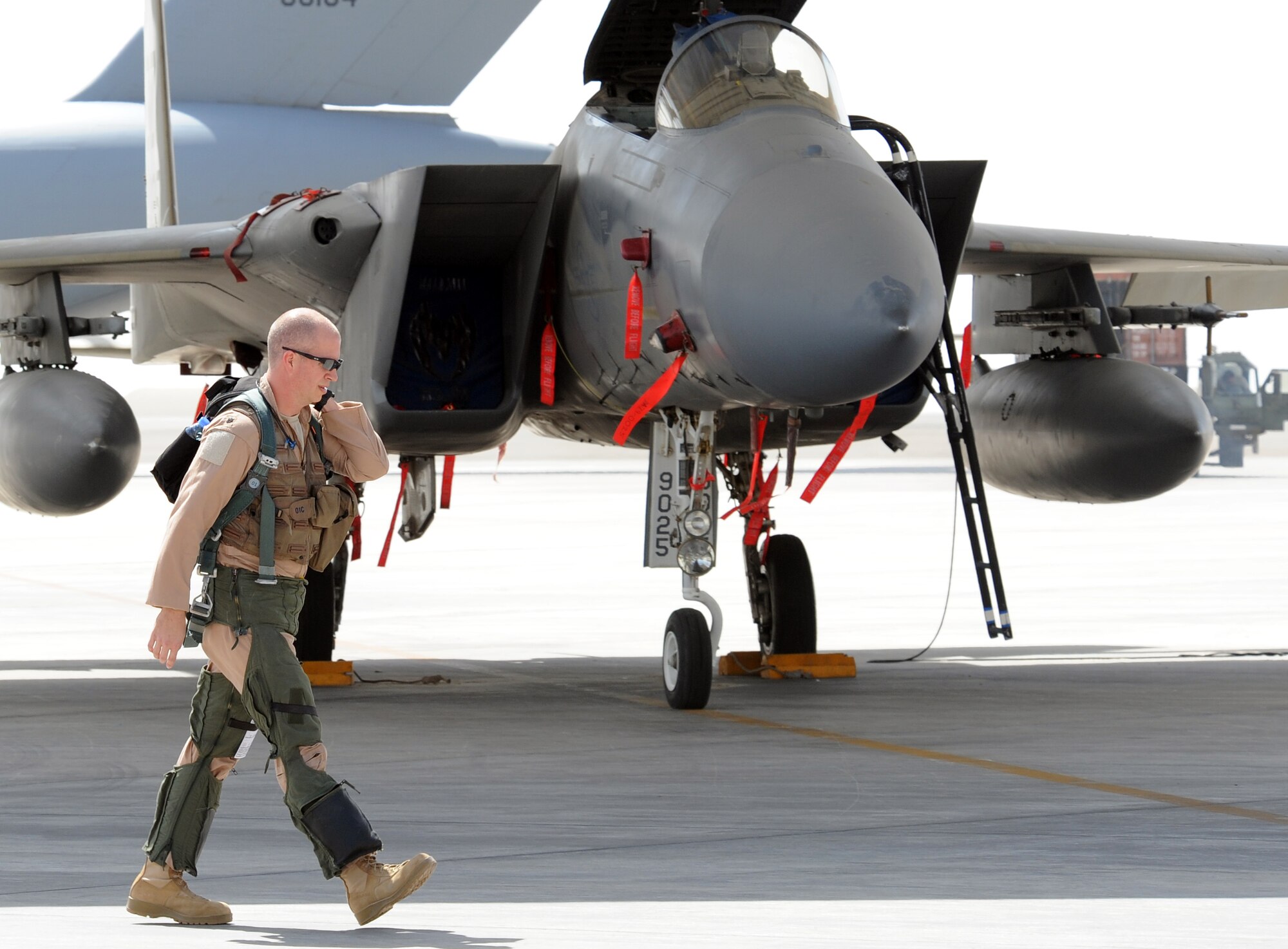 SOUTHWEST ASIA - Lt. Col. Joel Carey walks to his F-15 Eagle before a training sortie Feb. 22, 2012. The 44th Expeditionary Fighter Squadron, deployed from Kadena Air Base, Japan, flies with the 380th Air Expeditionary Wing in Southwest Asia. Their mission is both deterrence as part of the defense of the Arabian Gulf, and training with partners in the region. Carey is the 44th EFS commander. (U.S. Air Force photo/Staff Sgt. J.G. Buzanowski)