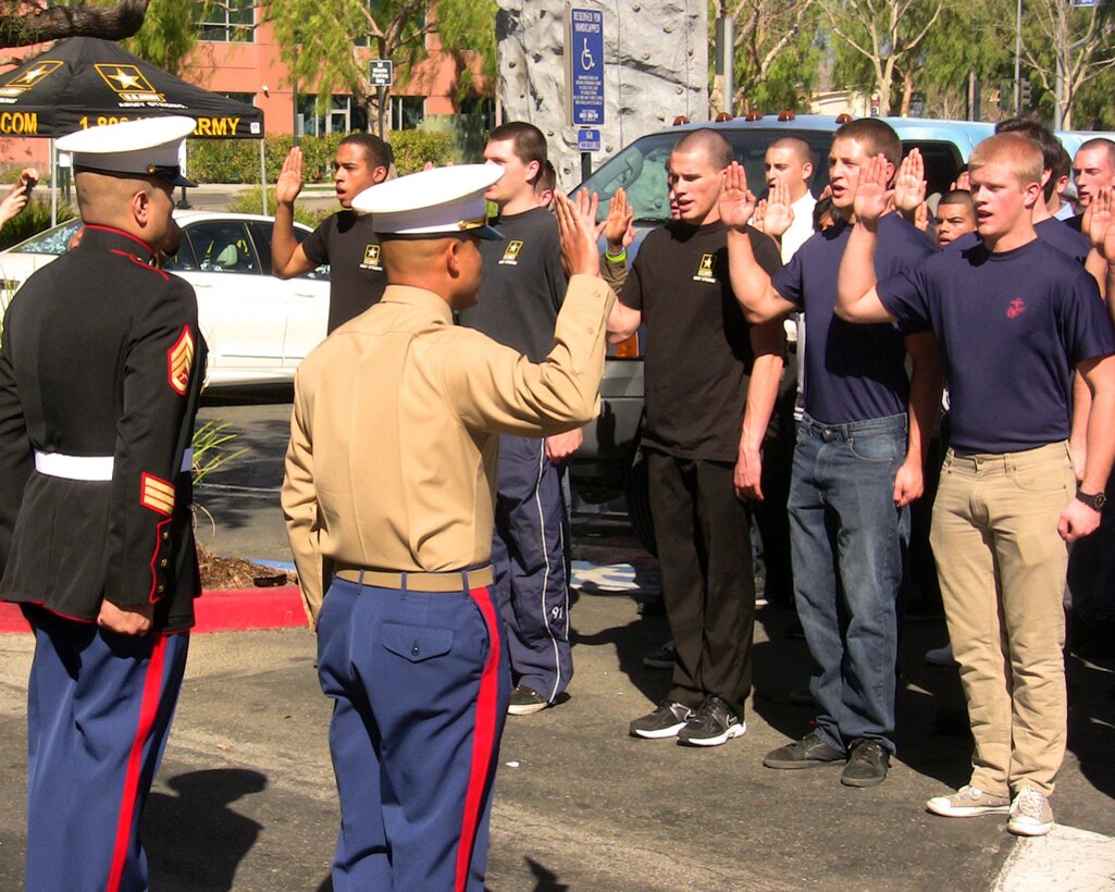 VALENCIA, Calif. — Nearly 100 future service members take the Oath of Enlistment Feb. 24 in a roped off parking lot of the Westfield Valencia Town Center mall in front of the Armed Forces' newest Career Center here. The U.S. Army Corps of Engineers Los Angeles District manages the lease of the 5,147 square foot facility, one of more than 250 in Southern California, Arizona and Nevada.