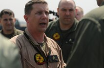 YOKOTA AIR BASE, Japan -- A Marine from the Chemical Biological Incident Response Force, II Marine Expeditionary Force deployed with an Initial Response Force (IRF) to Japan in support of Operation Tomodachi gives a brief on what they are going to expect. Approximately 15 members of the IRF deployed from Indian Head, Md. and have arrived at approximately 11 a.m. local time April 2, here at Yokota Air Base. The IRF can forward-deploy and respond to chemical, biological, radiological, nuclear incidents in order to assist in the conduct for consequence management operations. An IRF accomplishes the misson by providing capabilities for agent detection and indentification; casualty search, rescue, and personnel decontamination; and emergency medical care and stabilization of contaminated personnel. The intended mission of this IRF is to assist, and train as necessary, the Japan Self Defense Forces in the techniques and procedures they are likely to need as they respond to this crisis. (Photo by Army Agt. Cashmere C. Jefferson, Joint Support Force Public Affairs).