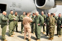 YOKOTA AIR BASE, Japan -- The Secretary of Defense recently approved the order for Chemical Biological Incident Response Force, II Marine Expeditionary Force to deploy an Initial Response Force (IRF) to Japan in support of Operation Tomodachi. Approximately 15 members of the IRF deployed from Indian Head, Md. and have arrived at approximately 11 a.m. local time April 2, here at Yokota Air Base. The IRF can forward-deploy and respond to chemical, biological, radiological, nuclear incidents in order to assist in the conduct for consequence management operations. An IRF accomplishes the misson by providing capabilities for agent detection and indentification; casualty search, rescue, and personnel decontamination; and emergency medical care and stabilization of contaminated personnel. The intended mission of this IRF is to assist, and train as necessary, the Japan Self Defense Forces in the techniques and procedures they are likely to need as they respond to this crisis. (Photo by Army Agt. Cashmere C. Jefferson, Joint Support Force Public Affairs).