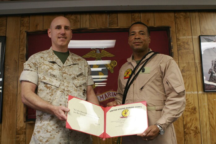 Navy Annex Stump Neck, Md. – Chemical Biological Incident Response Force’s Executive Officer, Lt. Col. Charles M. Long takes a moment to pose for a quick picture after Sgt. Maj.  Darrell L. Stillings, CBIRF’s Battalion Sergeant Major, graduated from the CBIRF Basic Operators Course. Regardless of rank, every Marine and sailor stationed at CBIRF has to attend and pass the three-week course. (Photo by: Sgt frances L Goch)(Released)