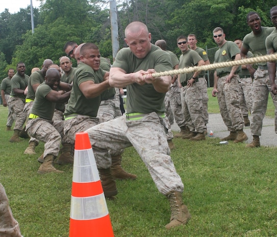 NAVAL SUPPORT FACILITY INDIAN HEAD, Md – Sgt. Cory Trott, CBRNE Warehouse Chief, Head Quarters and Support Company, Chemical Biological Incident Response Force, leads H&S Company’s team in a tug of war match against IRF B during CBIRF’s battalion field meet 24 May. Headquarters and Support Company, IRF A and IFR B all competed against one another in several events to strengthen unit cohesion after the safety brief before the Memorial Day weekend.
