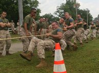 NAVAL SUPPORT FACILITY INDIAN HEAD, Md – Initial Response Force B fights against IRF A in a tug of war match during CBIRF’s battalion field meet 24 May. Headquarters and Support Company, IRF A and IFR B all competed against one another in several events to strengthen unit cohesion after the safety brief before the Memorial Day weekend.