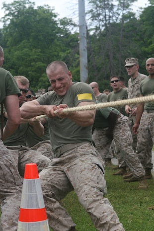 NAVAL SUPPORT FACILITY INDIAN HEAD, Md – Sgt. Jonathan Muff, Initial Response Force A Team Leader, Decontamination Platoon, Chemical Biological Incident Response Force, leads IRF A’s team in a tug of war match against IRF B during CBIRF’s battalion field meet 24 May. Headquarters and Support Company, IRF A and IFR B all competed against one another in several events to strengthen unit cohesion after the safety brief before the Memorial Day weekend.