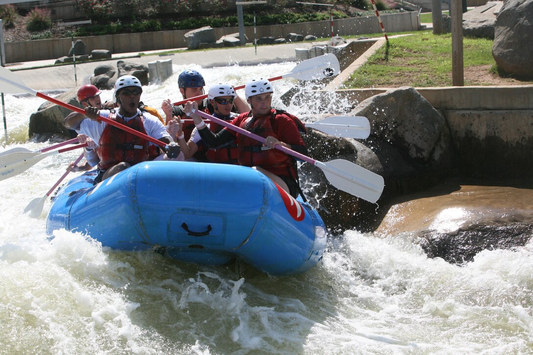 Marines with 1st Battalion, 10th Marine Regiment, 2nd Marine Division, navigate through different turns and obstacles while whitewater rafting at the U.S. National Whitewater Center in Charlotte, N.C., Sept. 29. The Marines with 1/10 participated in different extreme and outdoor sports as part of Operation Adrenaline Rush, a program geared towards post-deployment stress management.