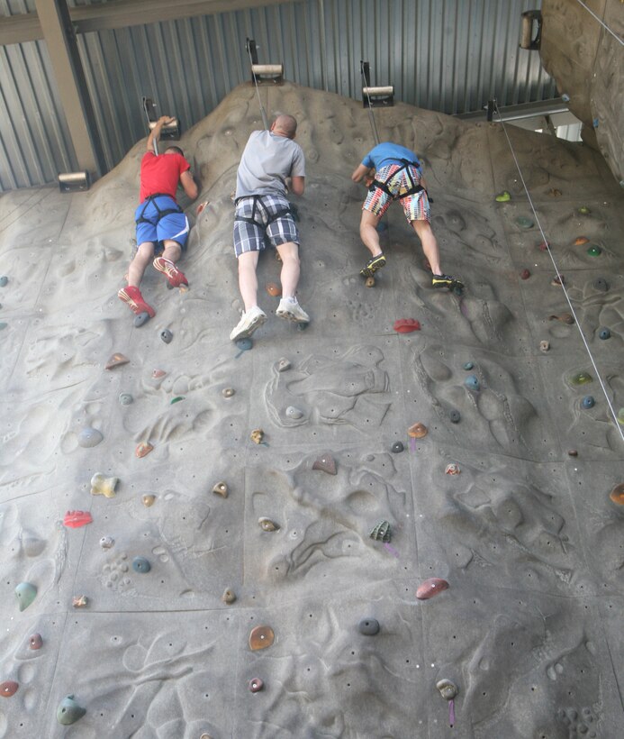 Marines with 1st Battalion, 10th Marine Regiment, 2nd Marine Division, go rock climbing at the U.S. National Whitewater Center in Charlotte, N.C., Sept. 29. The Marines with 1/10 participated in different extreme and outdoor sports as part of Operation Adrenaline Rush, a program geared towards post-deployment stress management.