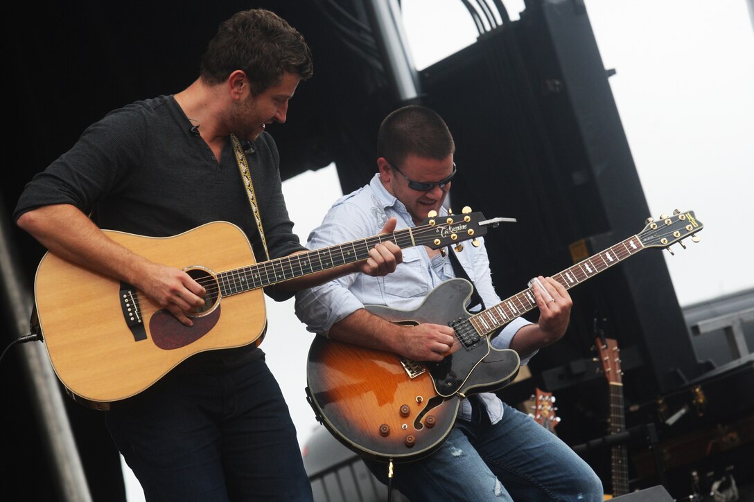 Brett Eldredge (left), a country music singer, and his guitarist Charlie Hutto jam out a chart-topper during the North Carolina Country Music Freedom Festival at the Deppe Agriculture and Music Pavilion in Maysville, N.C., Sept. 24. The festival, which included a day-long concert of various country music notables, was in support of the upcoming Corpsmen Memorial to be constructed in front of the planned Museum of the Marine, with all proceeds going toward the memorial foundation.