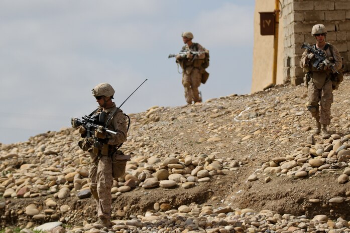 Marines with 2nd Platoon, Lima Company, patrol through a small village, going from compound to compound, talking to the local people Feb. 27, 2012. The Marines, currently deployed with 3rd Battalion, 7th Marine Regiment, searched for a suspected insurgent, apprehending him later in the day.