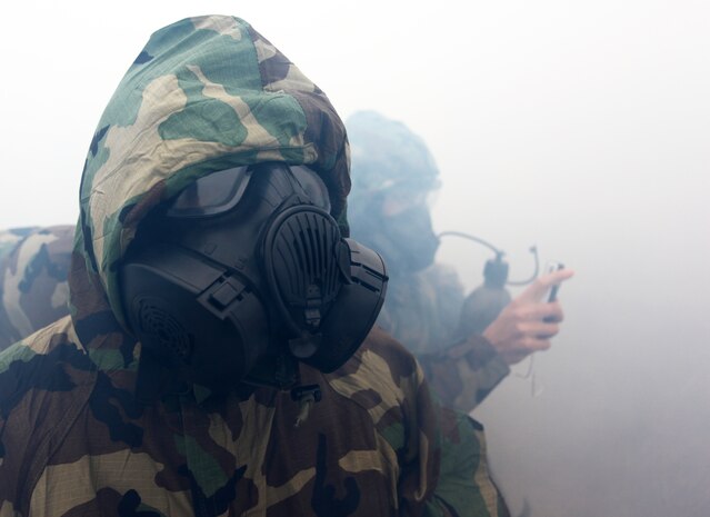 Marines and Sailors with Command Element, 24th Marine Expeditionary Unit, conduct annual chemical, biological, radiological and nuclear defense training aboard Camp Lejeune, N.C., Feb. 27, 2012. This training enabled the Marines to learn how to use the new M50 joint service general purpose gas mask.