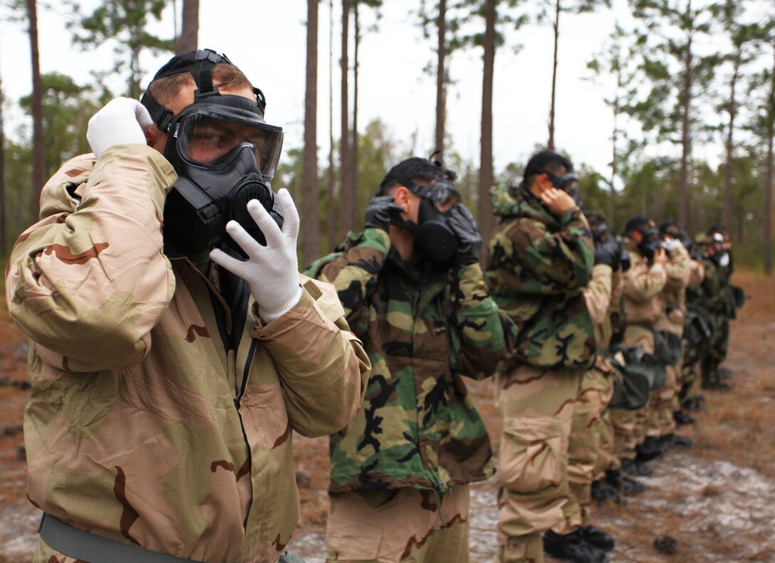 Marines and Sailors with Command Element, 24th Marine Expeditionary Unit, conduct annual chemical, biological, radiological and nuclear defense training aboard Camp Lejeune, N.C., Feb. 27, 2012. This training enabled the Marines to learn how to use the new M50 joint service general purpose gas mask.