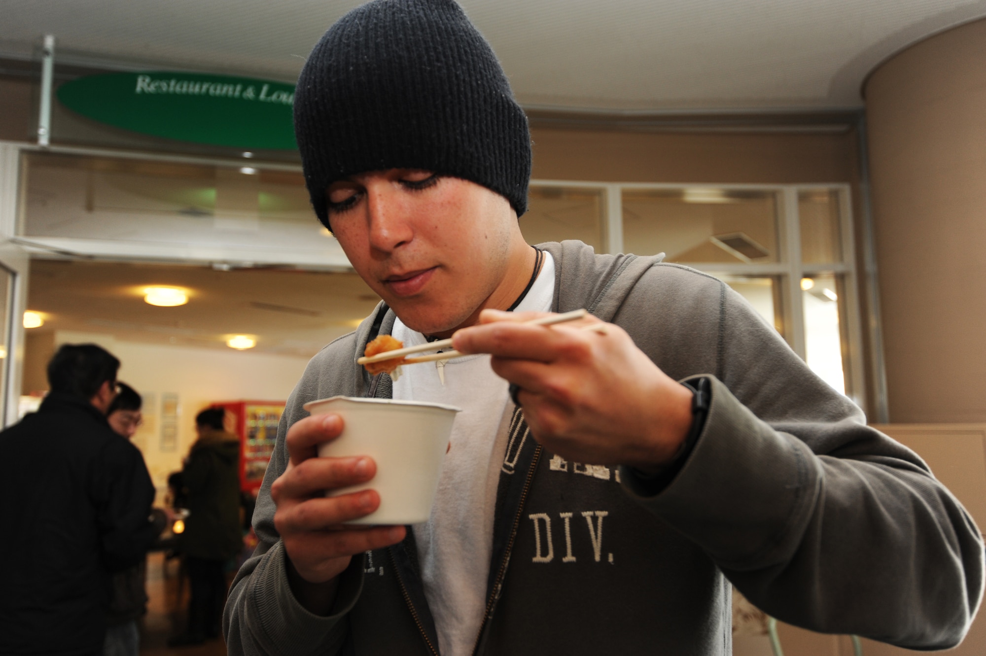 Alberto Rodriguez tries Hokki shellfish soup during the Japan-U.S. Exchange Festa at the Misawa International Center, Misawa City, Japan, Feb. 25, 2012. The dish consisted of fried Hokki clam dumplings and spinach in a kelp stock with spicy shrimp on the side. The exchange allowed U.S. and Japanese cooks to partner and create new soup dishes. (U.S. Air Force photo by Airman 1st Class Kia Atkins/Released)