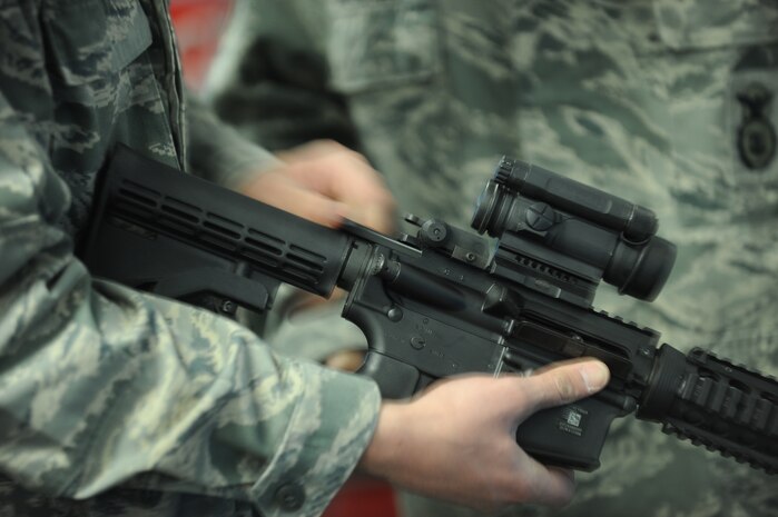 An Airman conducts a function check of his weapon during a combat arms training course Feb. 24, 2012, at Nellis Air Force Base, Nev. The combat arms course curriculum changed Dec. 1, 2011. (U.S. Air Force photo by Senior Airman Jack Sanders)