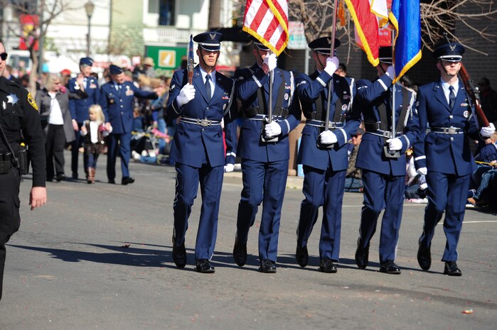 Members of the Beale Air Force Base Honor Guard march in the 132 Annual Bok Kai parade in Marysville, Calif., Feb 25, 2012. The parade is one of the oldest continuous in the country and is held in recognition of the Chinese immigrants who worked gold mines during the 1800s. (U.S. Air Force photo by Staff Sgt. Sarah Brown/Released)