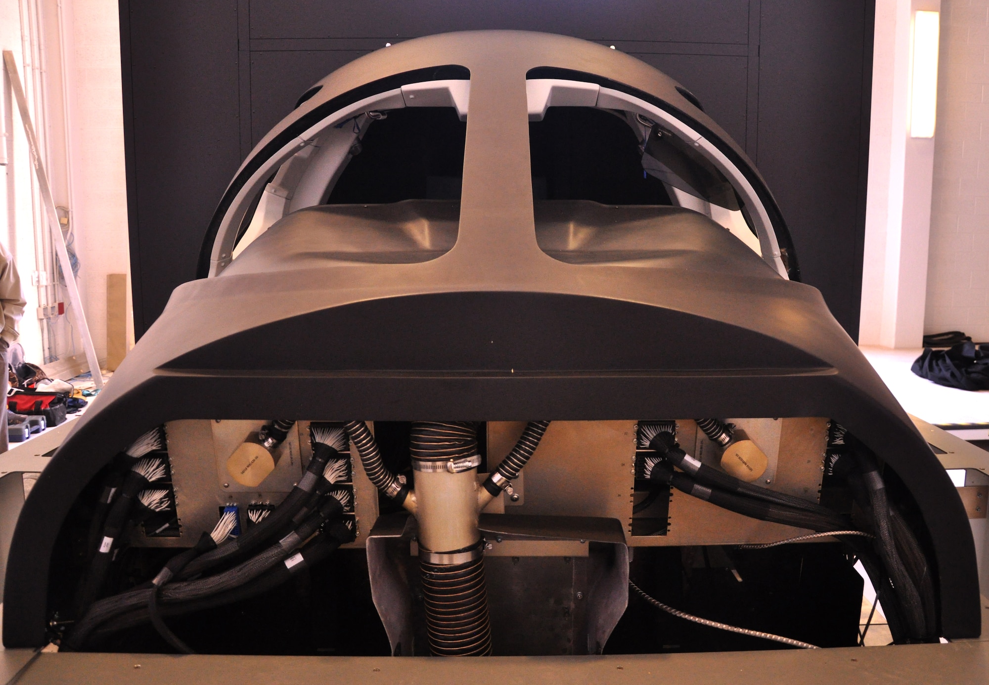 An exterior cockpit view of the T-1A Jayhawk flight simulator built by the L-3 Communications company and delivered to Vance Air Force Base, Okla., Feb. 22. A second part of the simulator, the visual section, is scheduled for delivery and installation in early May. (U.S. Air Force photo/ Airman 1st Class Frank John Casciotta)