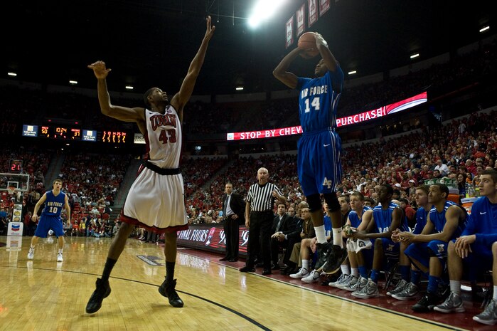 Michael Lyons, U.S. Air Force Academy "Falcons" junior guard, pulls up for a 3 point shot against the University of Nevada Las Vegas, at the Thomas and Mack Center, Feb. 25, 2012, in Las Vegas, Nev. The Air Force Falcons came up short against UNLV 68-58, making their record 13-13 overall and 3-9 in the Mountain West Conference. (U.S. Air Force photo by Airman 1st Class Daniel Hughes)