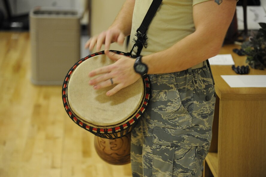 LAUGHLIN AIR FORCE BASE, Texas – An Airman plays the drums at an African dance class at the Losano Fitness Center here Feb. 21. The Laughlin African American Heritage Month Committee hosted events throughout February honoring the cultural and historical contributions of African Americans. (U.S. Air Force photo/Airman 1st Class Nathan L. Maysonet)