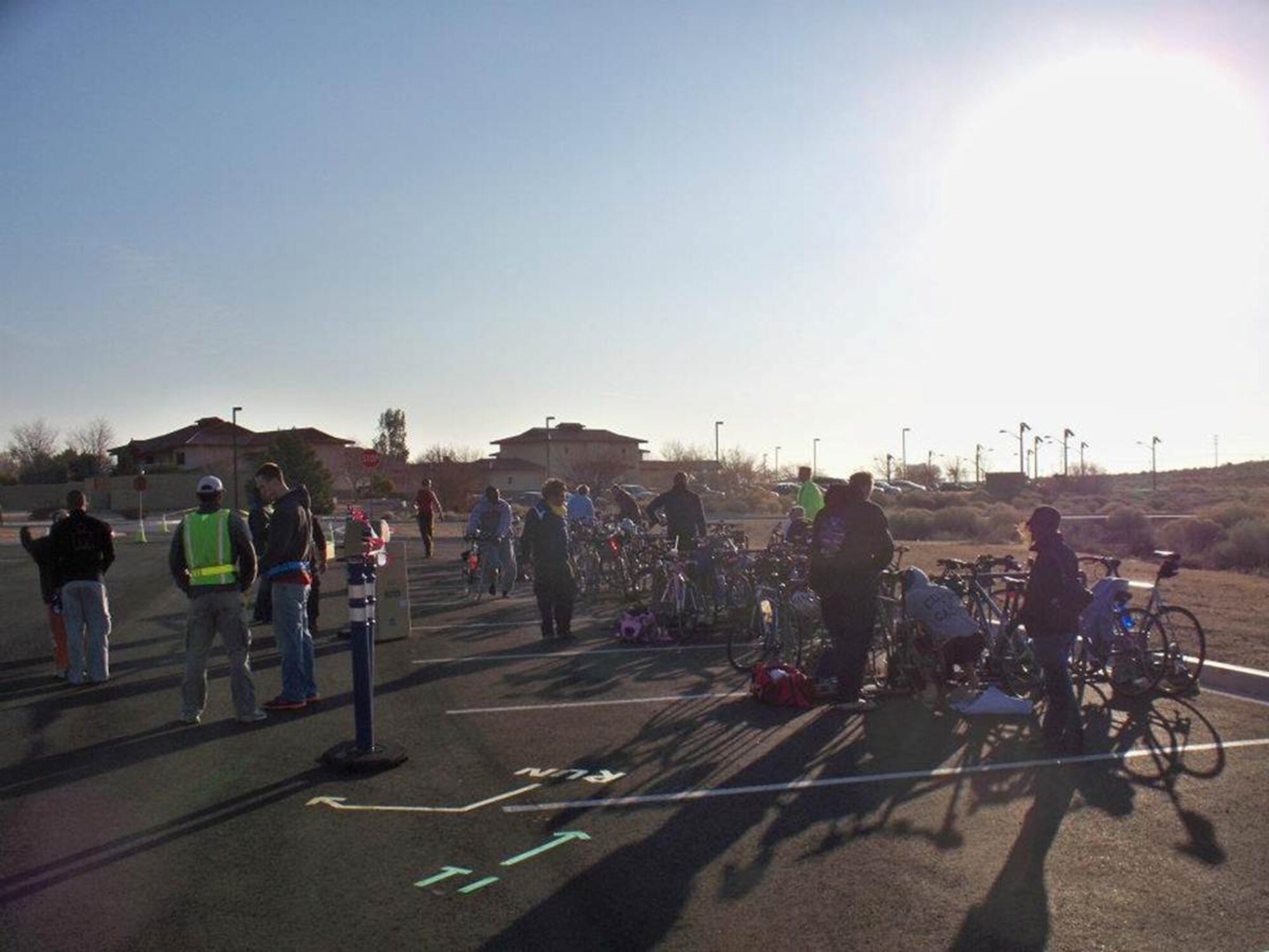 Thirty-eight triathletes gather at the transition point between the 500 meter swim at the Oasis Pool and the 13 mile bicycle ride during the “High Desert Sprint Triathlon” Feb. 25.  The newly forming Edwards Triathlon Club will attempt to host several races at Edwards each year. (Courtesy photo by Lt. Col. Kathy Hughes)  
