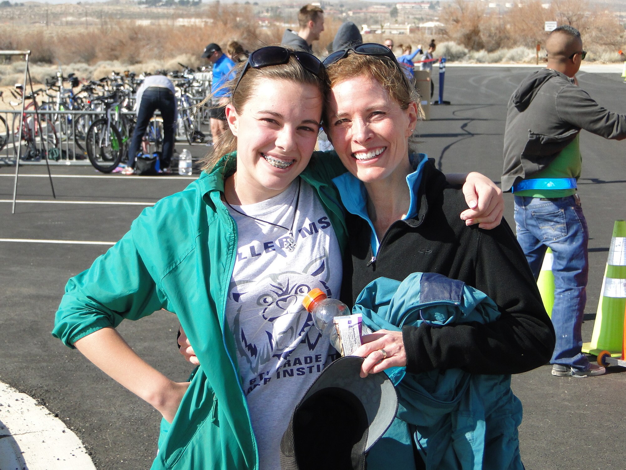 Thirteen-year-old Ally Azzano and her mother Jennifer, daughter and wife of 412th Operations Group commander Col. Christopher Azzano, pose for a picture during the “High Desert Sprint Triathlon” Feb. 25. Triathletes ranging from ages 13 to 66 participated in the event with Ally being the fastest swimmer overall. (Courtesy photo by Col. Christopher Azzano)