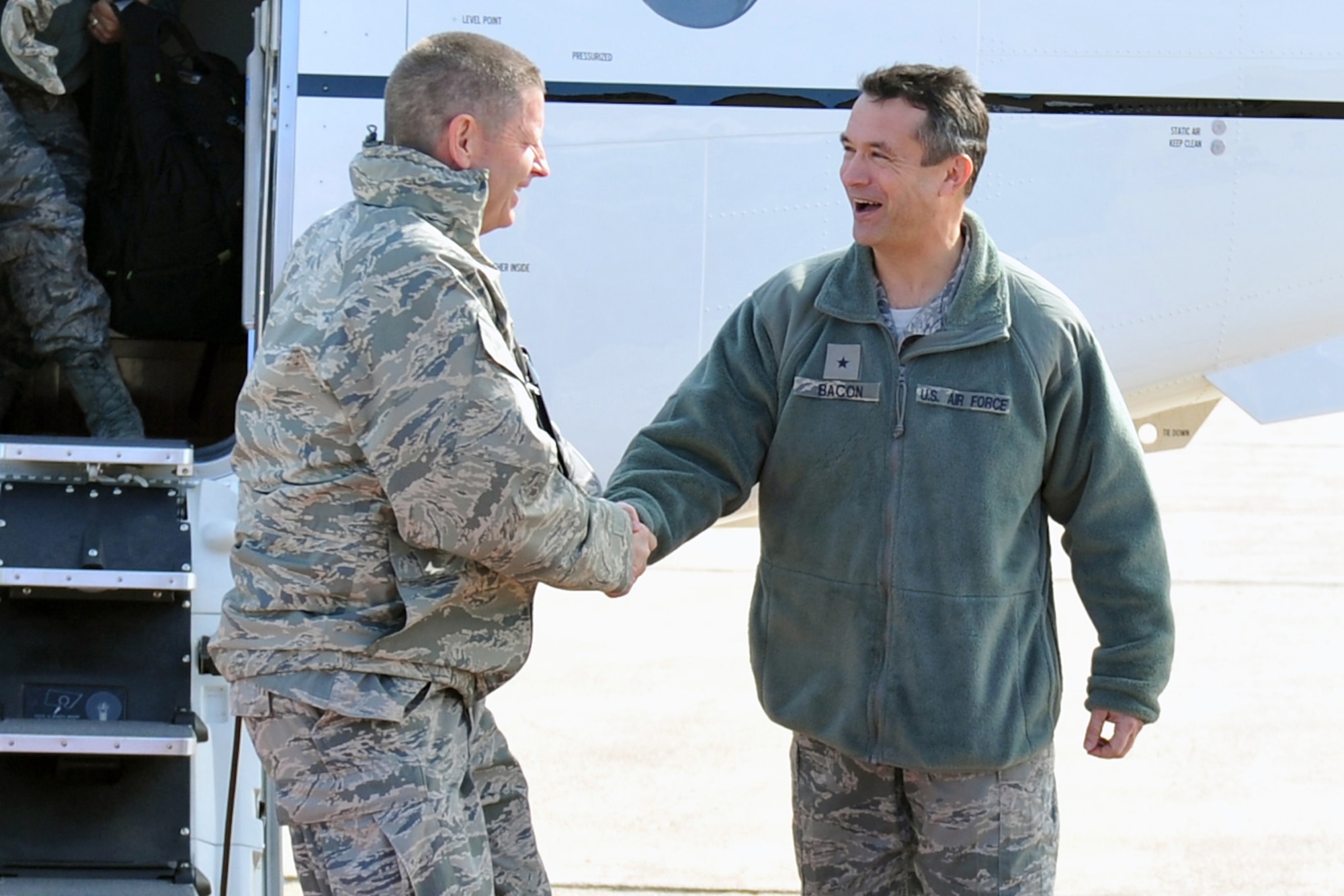 U.S. Air Force Brig. Gen. Donald Bacon, 55th Wing commander, welcomes Lt. Gen. Robin Rand, 12th Air Force commander, as he arrives at Offutt Air Force Base, Neb., Feb. 21. Rand became the commander of 12th Air Force in December 2011. (U.S. Air Force photo by Jeff W. Gates).