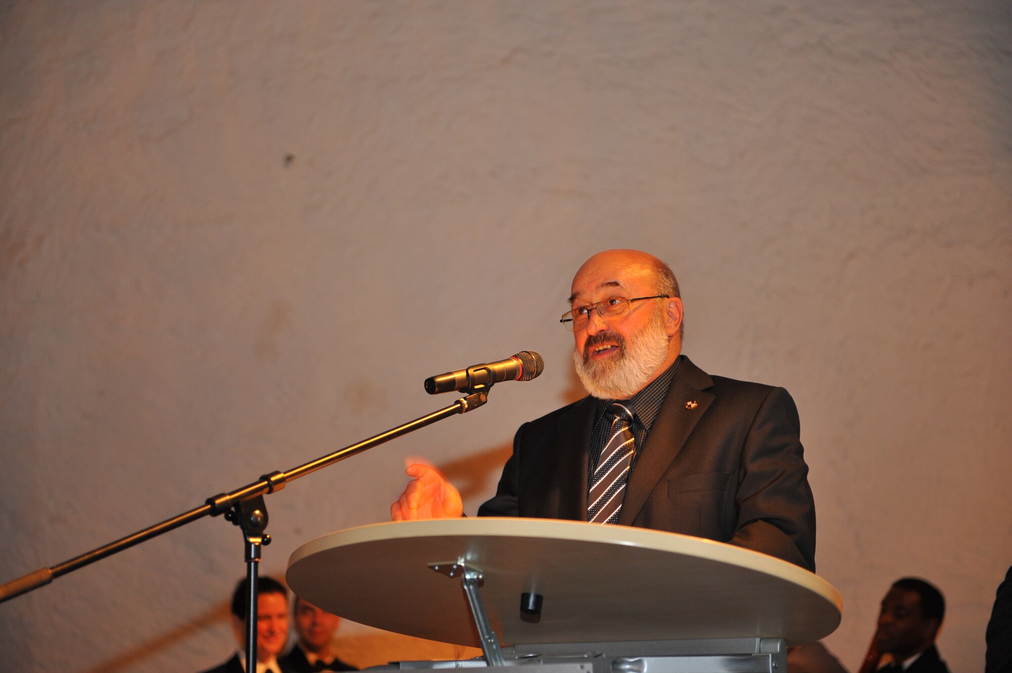 NIEDERWEIS, Germany – Josef-Peter Mertes, former Trier district government president, speaks to 52nd Fighter Wing leadership and German civic leaders about the importance of U.S. and German partnership during the 52nd FW Honorary Commanders Banquet at Niederweis Castle here Feb. 24. The banquet is held to ceremoniously induct German civic leaders into the honorary commander program through a tradition of passing the 52nd FW guidon to the new honored commander. The honorary commander program allows squadron, group and wing commanders to bolster and sustain partnerships with local leaders by working alongside one another to talk about and resolve community issues. (U.S. Air Force photo by Airman 1st Class Dillon Davis/Released)