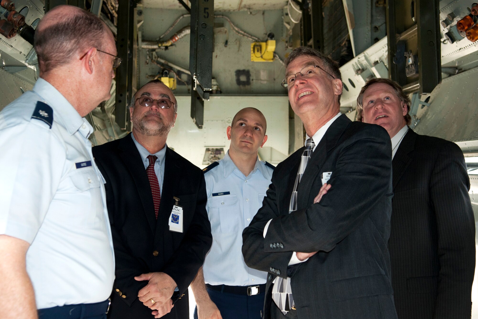 U.S. Air Force Lt. Col. Bruce Gootee, 93rd Bomb Squadron director of operations, shows members of the Sandia National Laboratories (SNL) the bomb bay of a 93rd BS B-52H Stratofortress at Barksdale Air Force Base, La., Feb. 27, 2012. Dr. Jerry McDowell, SNL executive vice president, Dr. Bruce Walker, SNL chief weapons engineer, and Dr. James Handrock, director of New Mexico Weapon Systems Engineering Center, visited Barksdale as part of a collaboration with the Air Force. (U.S. Air Force photo by Master Sgt. Greg Steele/Released)
