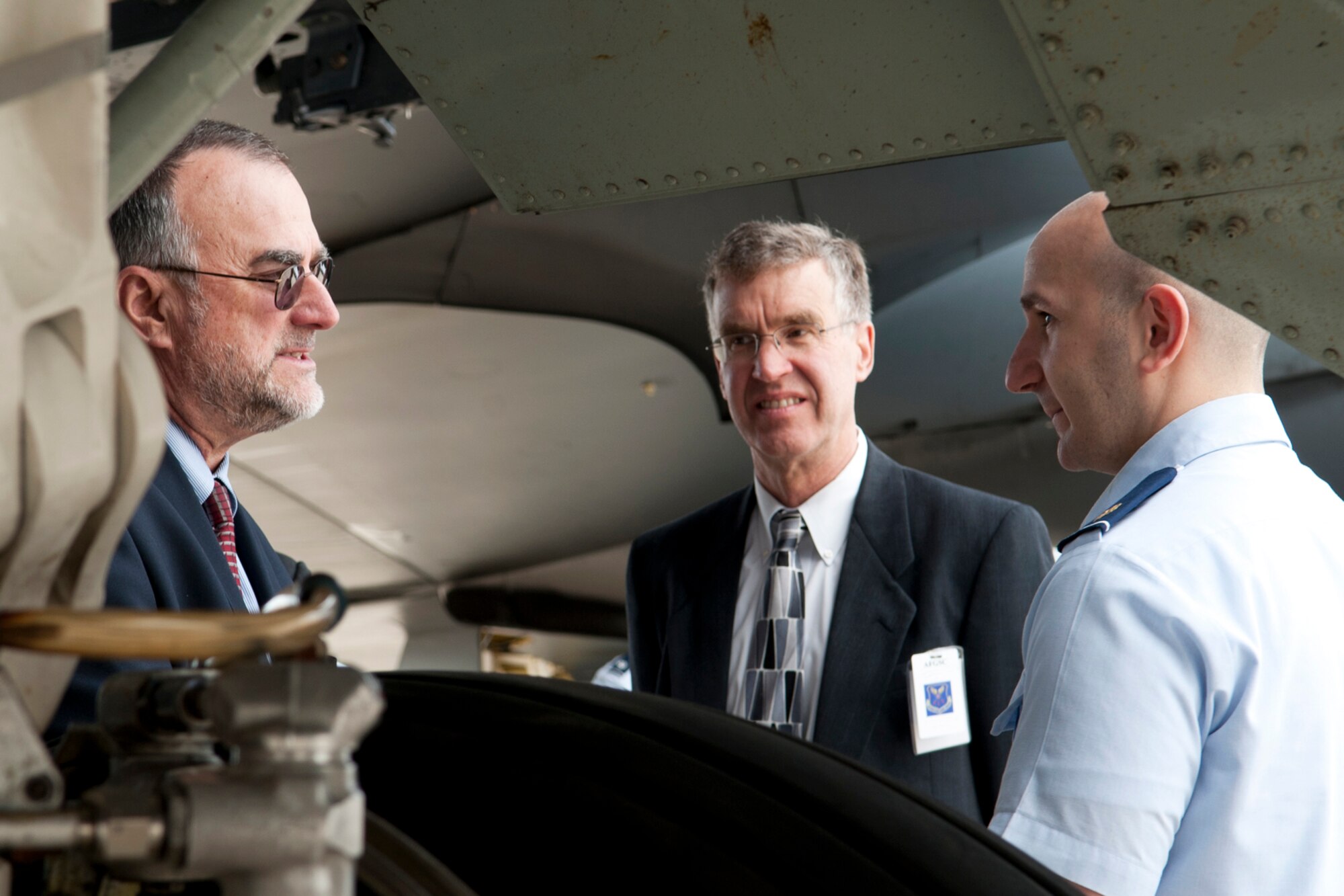 Dr. Jerry McDowell, Sandia National Laboratories executive vice president, asks U.S. Air Force Maj. Ronald Nigro, 11th Operations Group Standardization/Evaluation Program, a question about the landing capabilities of the B-52 bomber, Barksdale Air Force Base, La., Feb. 27, 2012. Sandia Corporation, a Lockheed Martin company, manages Sandia for the U.S. Department of Energy's National Nuclear Security Administration and has been developing science-based technologies that support our national security since 1949. (U.S. Air Force photo by Master Sgt. Greg Steele/Released)