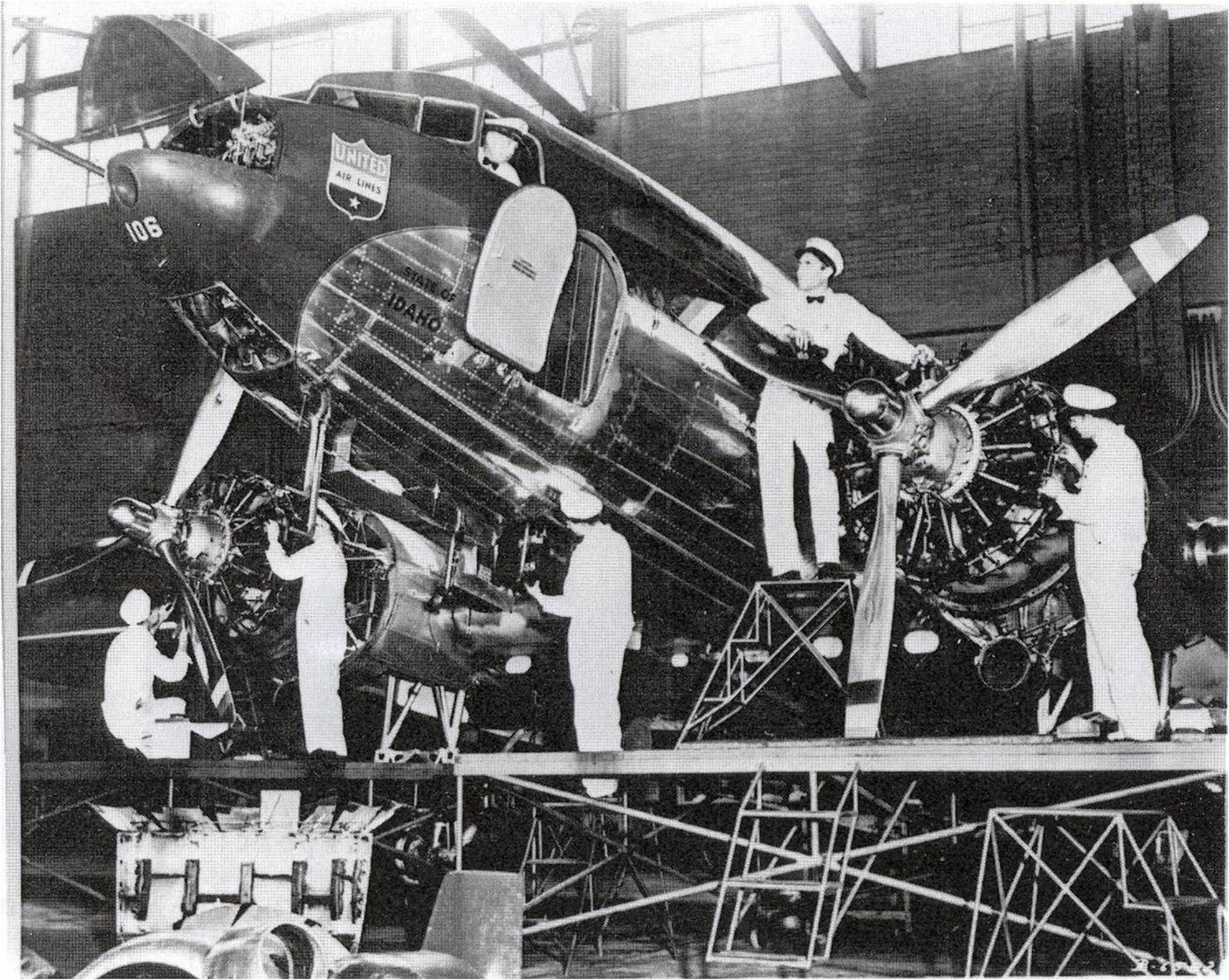 Mechanics work diligently on a Untied Airlines aircraft in Cheyenne, Wyo. (Image courtesty of Wyoming State Archives)