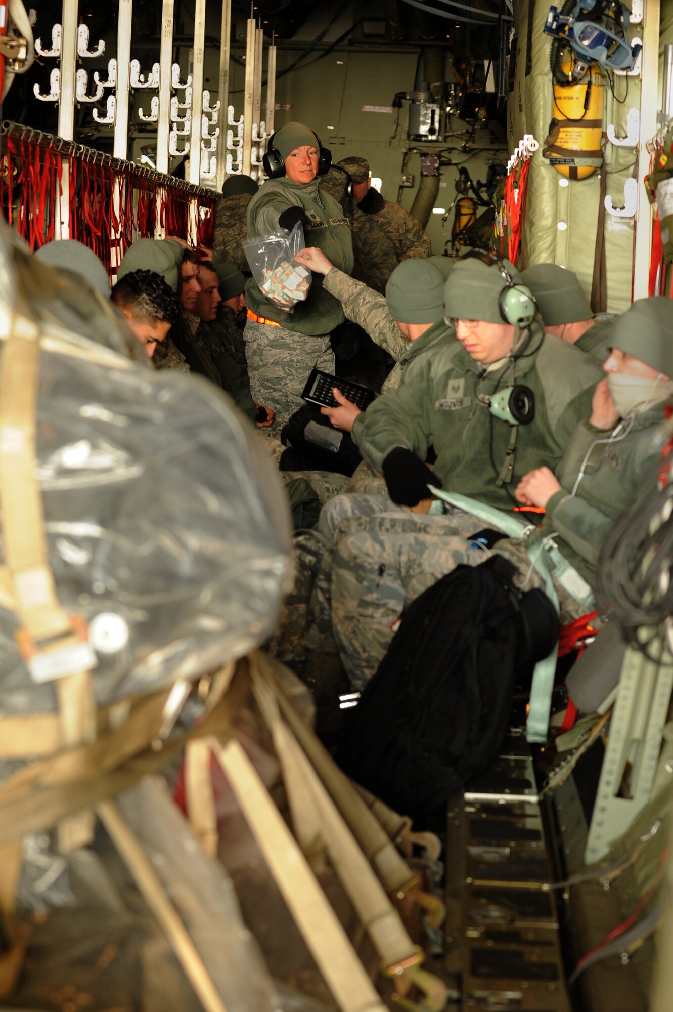 SPANGDAHLEM AIR BASE, Germany – Airmen from the 52nd Fighter Wing are briefed safety procedures aboard a C-130 Hercules here Feb. 27 prior to their flight to Turkey in support of Anatolian Falcon 2012, a weapons training deployment that includes interdiction, attack, air superiority, defense suppression, airlift, air refueling and reconnaissance. More than 250 Airmen from the wing will participate in the exercise hosted at Turkish air force’s Konya Air Base. The U.S. and Turkish air forces will work together and improve both nations’ combat readiness through tactical training during the exercise. (U.S. Air Force photo by Airman 1st Class Matthew B. Fredericks/Released)