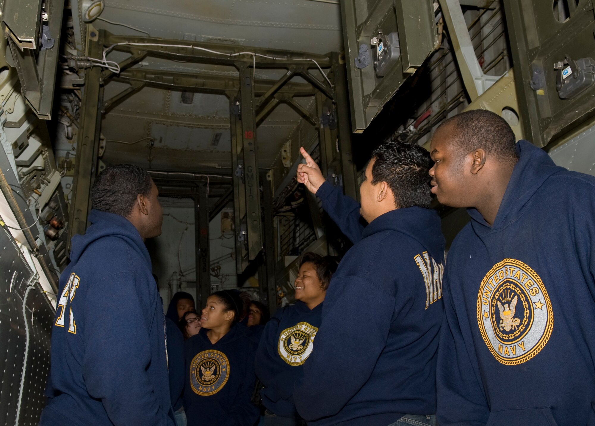 Navy Junior Reserve Officers' Training Corps cadets look inside a B-52H Stratofortress on Barksdale Air Force Base, La., Feb. 24. JROTC cadets from Camden Fairview High School in Arkansas toured the base in order to gain a better understanding of military operations. (U.S. Air Force photo/Airman 1st Class Benjamin Gonsier)(RELEASED) 