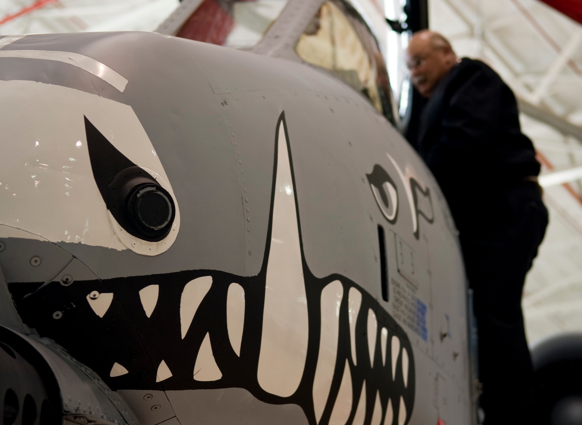 Retired Navy Petty Officer 1st Class Jimmie Walls, Navy Junior Reserve Officer's Training Corps instructor, views the inside of an A-10 Thunderbolt II cockpit on Barksdale Air Force Base, La., Feb. 24. Camden Fairview High School JROTC cadets and instructor from Arkansas toured the base to see day-to-day military operations. (U.S. Air Force photo/Airman 1st Class Benjamin Gonsier)(RELEASED)
