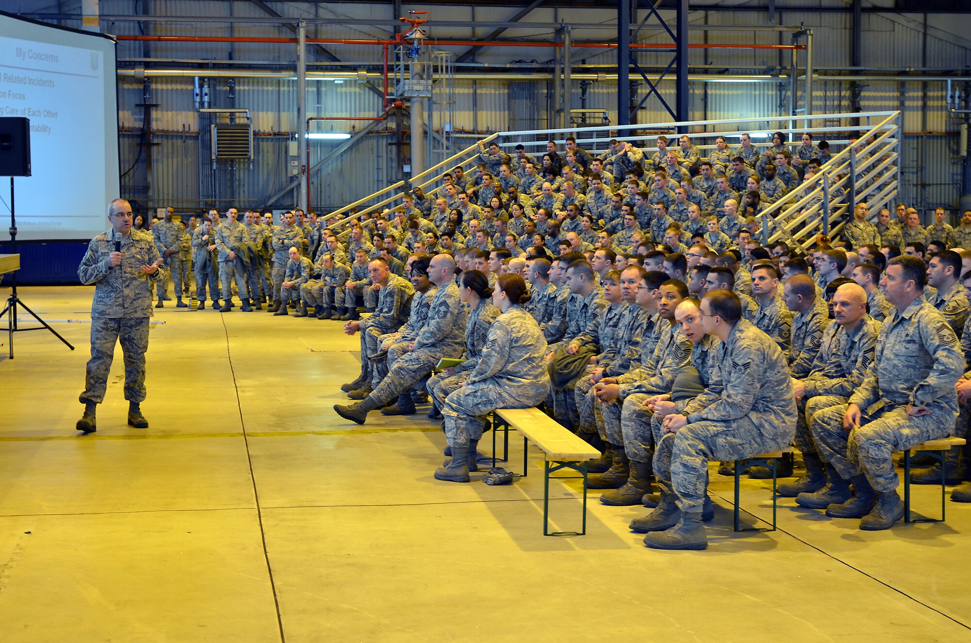 Chief Master Sgt. James Morris, 86th Airlift Wing command chief, talks to Team Ramstein members during an enlisted call, Feb. 28, 2012, on Ramstein Air Base, Germany.  Chief Morris conducted enlisted calls in the morning and afternoon for members to ask direct questions pertaining to the current operations through-out the Air Force.(U.S. Air Force photo by Staff Sgt. Chris Willis)