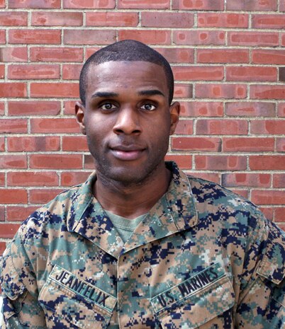 Lance Cpl. Kenny Jeanfelix, a legal service specialist with Combat Logistics Regiment 27, 2nd Marine Logistics Group, poses for a photo aboard Camp Lejeune, N.C., Feb. 23, 2012. The Brooklyn, N.Y., native was nominated for a meritorious promotion after being chosen by Staff Sgt. Tony Holmes, the military justice staff noncommissioned officer in charge, for his leadership, abilities and traits. (U.S. Marine Corps photo by Pfc. Franklin E. Mercado)