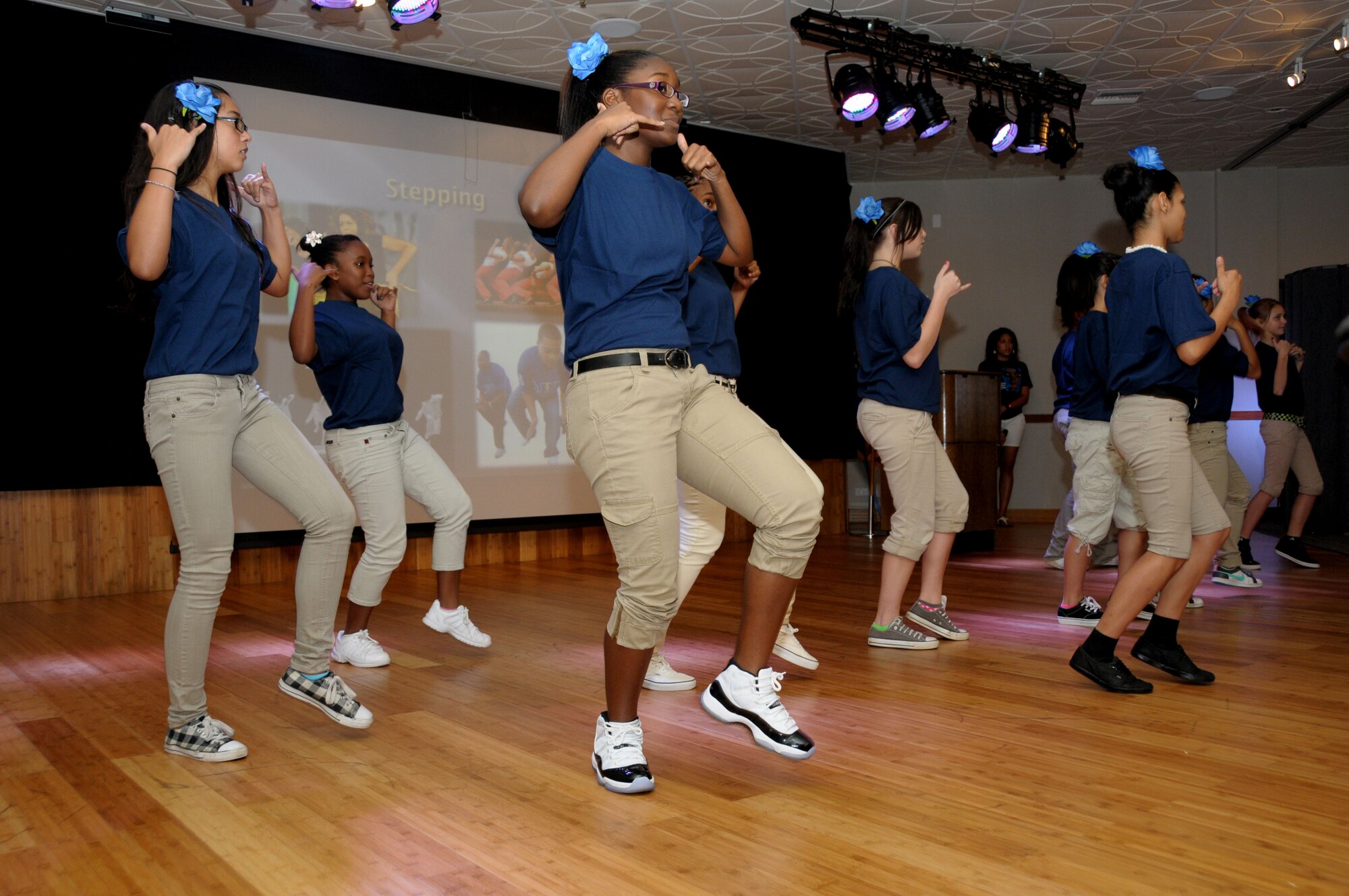 The Andersen Middle School’s step team performs during the Black History Month celebration luncheon sponsored by Andersen’s multicultural committee Feb. 24.  (U.S. Air Force photo/Senior Airman Jeffrey Schultze)  