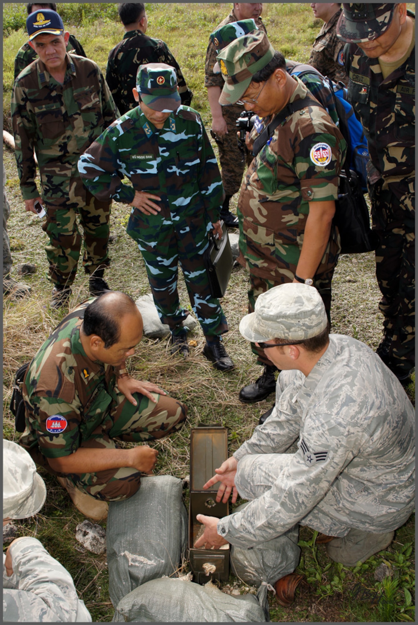 Delegates visited Andersen's explosive ordnance disposal unit where Airmen demonstrated various techniques and procedures utilized by the 36th Wing. As part of U.S. Pacific Command’s Theater Security Cooperation Program, a multilateral subject-matter expert exchange co-hosted by senior civil engineer and security forces personnel from Headquarters 13th Air Force concluded here Feb. 23. (U.S. Air Force photo/ Capt. Grant Harwell)