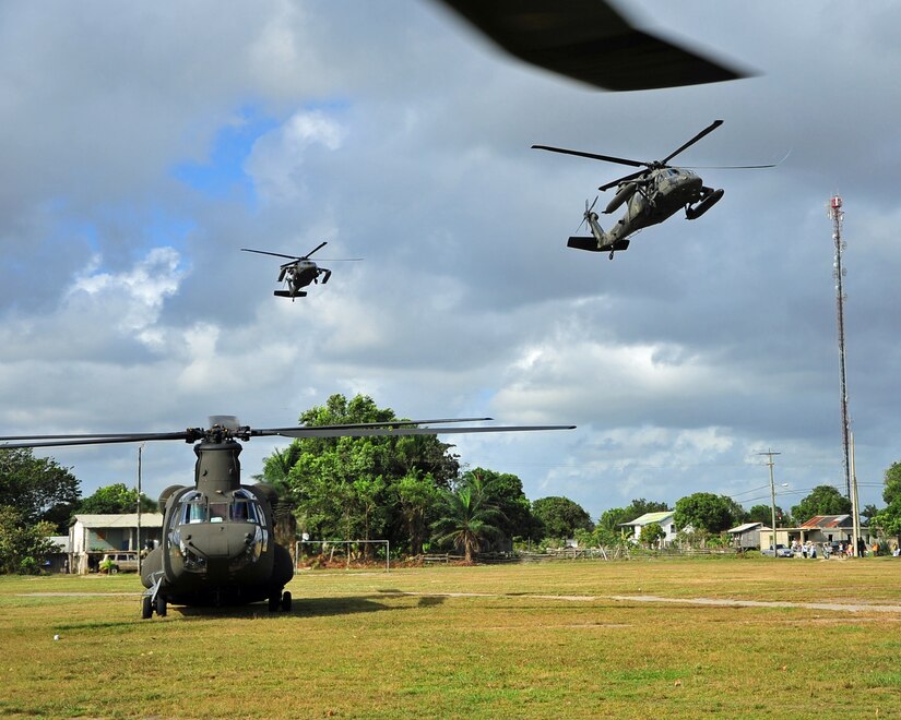 INDEPENDENCE, Belize – Four helicopters from U.S. Army 1st Battalion, 228th Aviation Regiment stationed at Joint Task Force-Bravo, Soto Cano Air Base, Honduras, transported a 46-member joint medical readiness exercise team to Independence, Belize for the final day of the two-day MEDRETE in Belize Feb. 29. (U.S. Air Force photo/Staff Sgt. Bryan Franks) 

