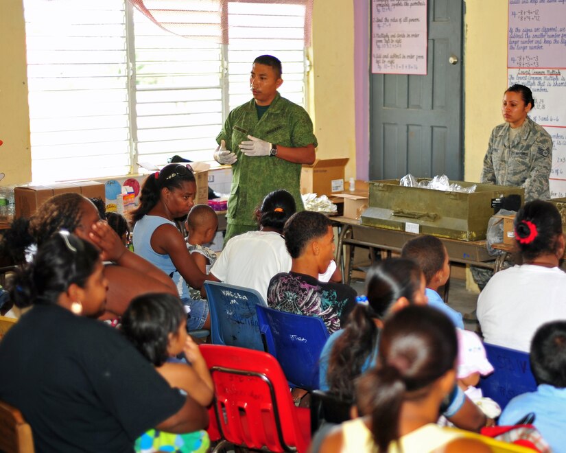 INDEPENDENCE, Belize – Belize Defence Force Lance Cpl. Richardo Ayala, conducts a preventive medicine course for Independence community members prior to them seeing the medical care providers during a joint medical readiness training exercise here Feb. 29. Members from the Belize Ministries of Health and Education, Belize Defence Force and Joint Task Force-Bravo, Soto Cano Air Base, Honduras provided medical services to approximately 460 members of the local area Feb. 29. (U.S. Air Force photo/Staff Sgt. Bryan Franks)
